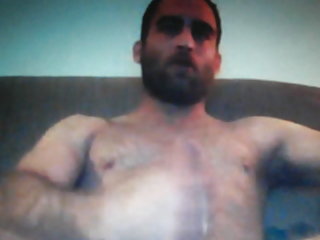 Smoking hairy  bear jerking on cam