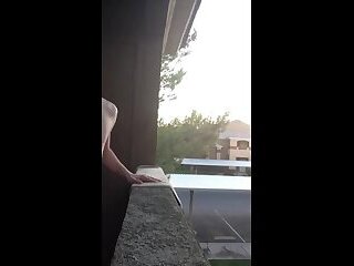 Exhibitionist jacking off on balcony almost seen